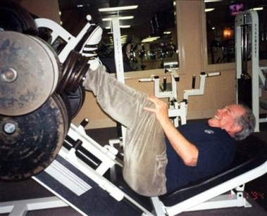 This photo provided by the Christian Broadcasting Network shows religious broadcaster Pat Robertson leg pressing what is claimed to be 2,000 pounds at the fitness center at the Founders Inn on Regent University campus in Virginia Beach, Va., Feb. 1, 2003. A CBN spokesman claims the photo is from 2003 even though the date stamp on the photo says 8/1/1994. (AP Photo/Christian Broadcasting Network)